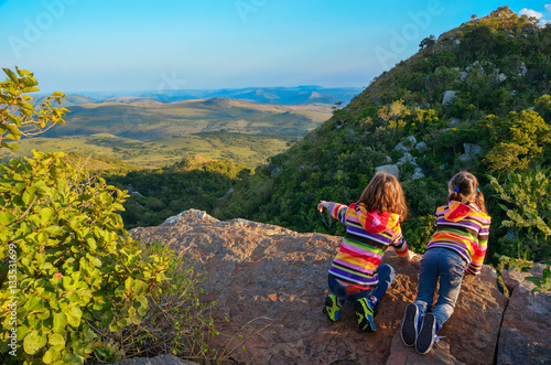 Family travel with children  kids looking from mountain viewpoint  holiday vacation in South Africa  