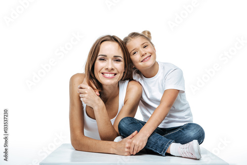 Smiling mother and daughter © LIGHTFIELD STUDIOS