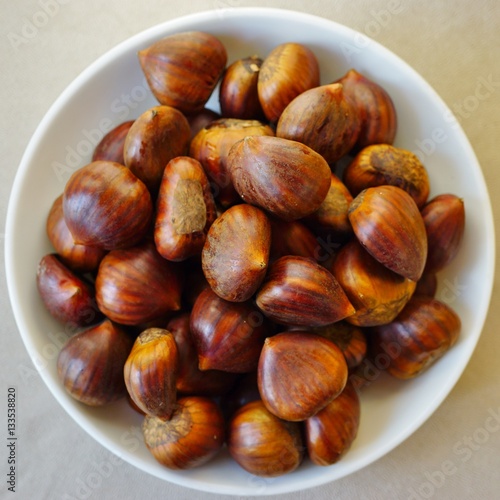 Bowl of fresh Italian chestnuts in the shell in winter