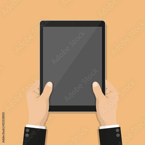 Businessman hands holding tablet with blank screen in a flat design