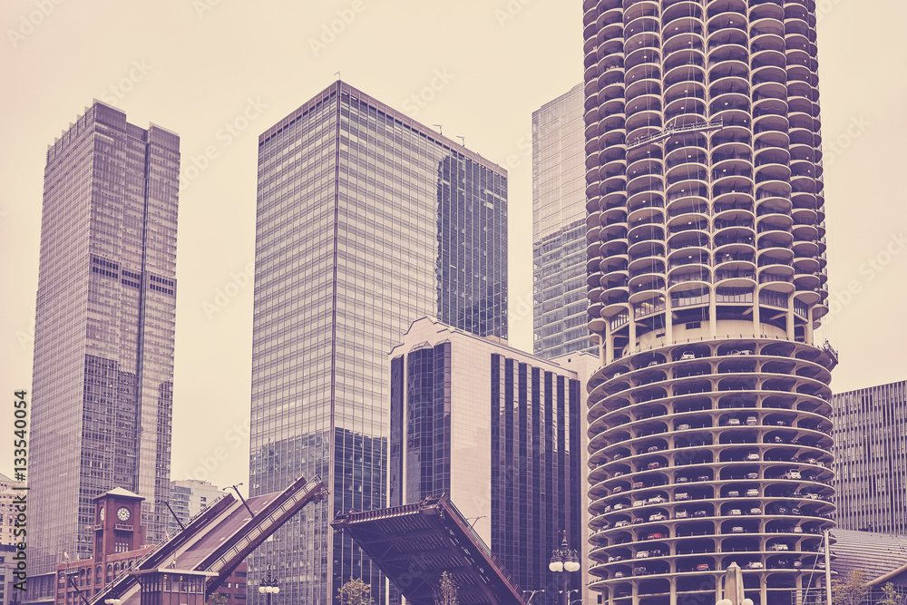 Obraz premium Vintage toned Chicago downtown on a cloudy day, USA.