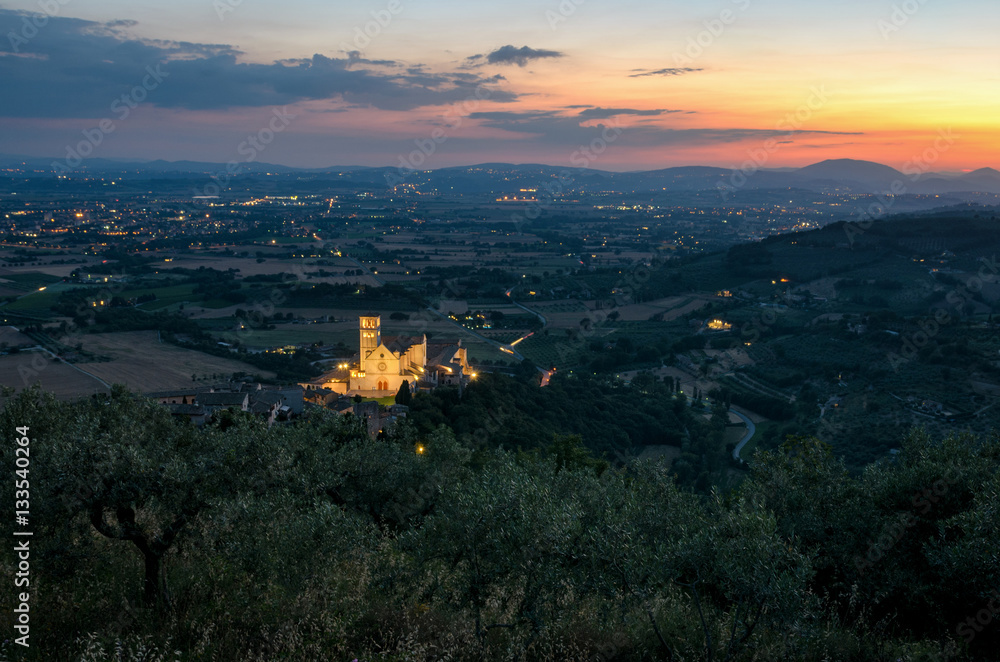 Naklejka premium Assisi (Umbria) Basilica di San Francesco at sunset