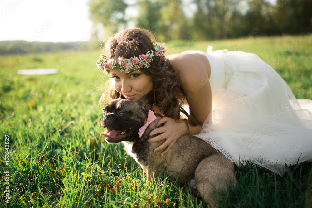 Beautiful bride in wedding dress and with a lovely mood in nature Beautiful bride in wedding dress and with a lovely mood in nature