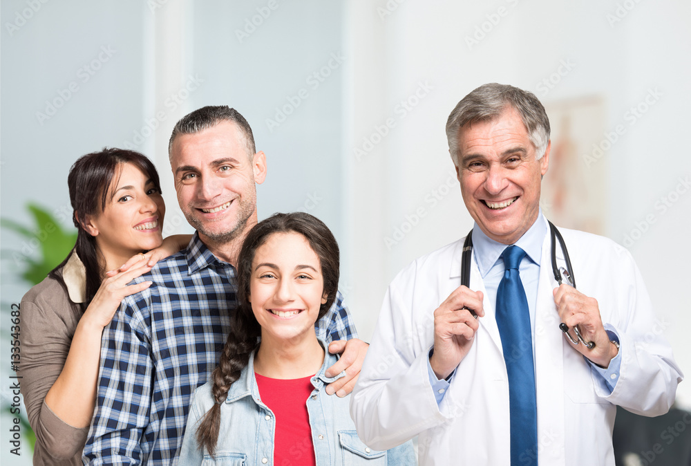 Smiling doctor and an happy family