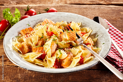 close up of salmon farfalle photo