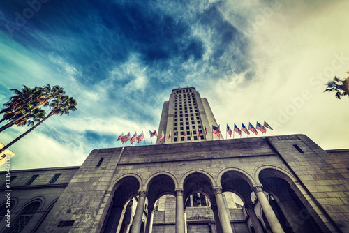 Los Angeles city hall under a dramatic sky