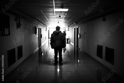 Human silhouette in the corridor