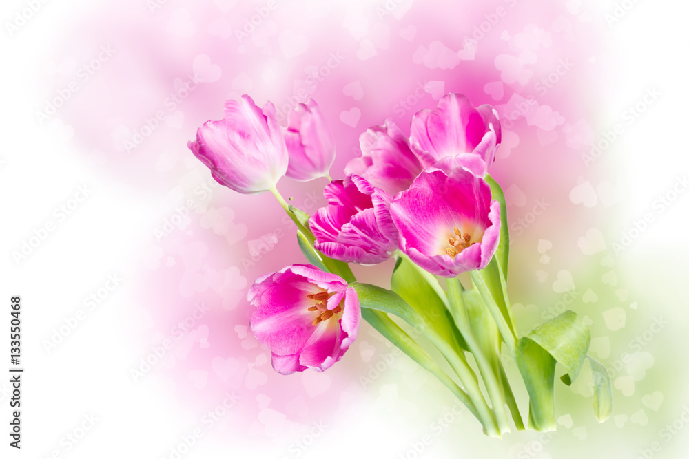 Obraz premium Beautiful bouquet of purple tulips on bright background