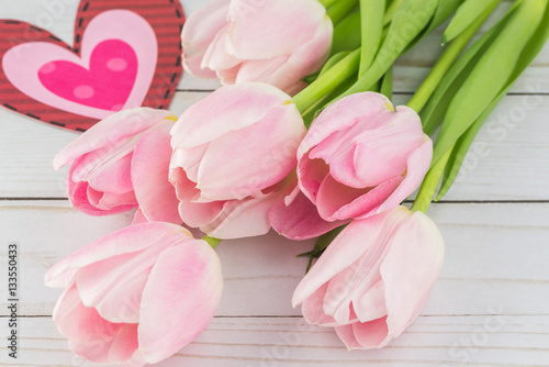 Fototapeta Naklejka Na Ścianę i Meble -  Greeting card for Valentines Day with tulips.