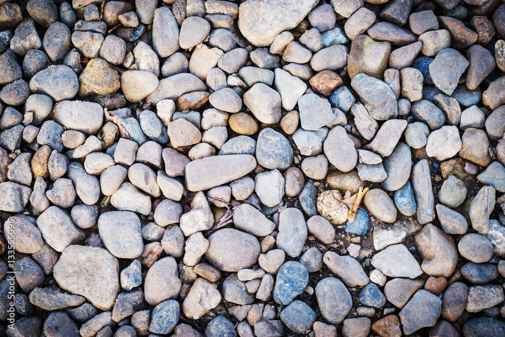 Round grey pebbles stones background Round grey pebbles stones background