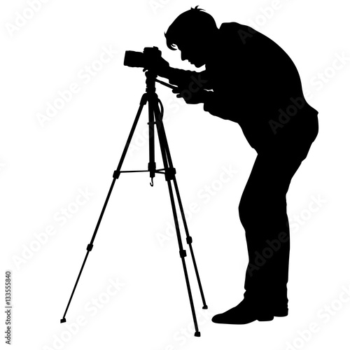 Cameraman with video camera. Silhouettes on white background. Vector illustration