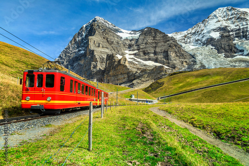 Electric tourist train and Eiger North face, Bernese Oberland, Switzerland