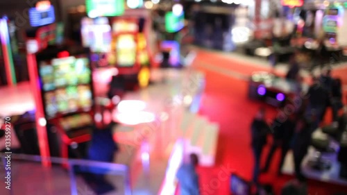 Wallpaper Mural Blurry image of slots machines and other gambling equipment at a casino. Out of focus (bokeh) colourful and high contrast picture in a casino. Panning Torontodigital.ca