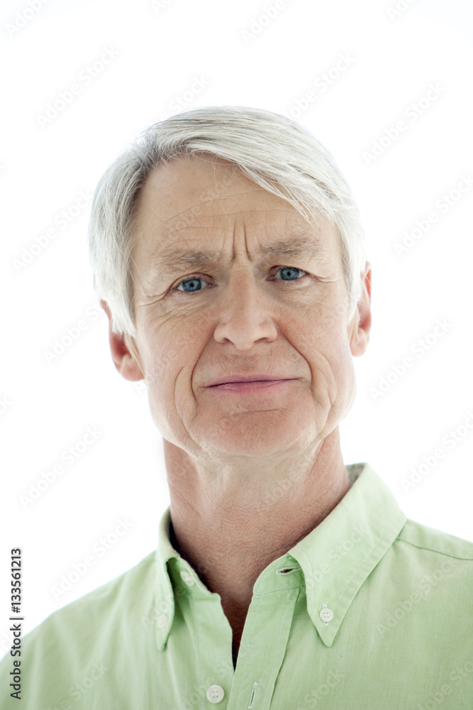 Portrait of a senior Caucasian man over white background Portrait of a senior Caucasian man over white background