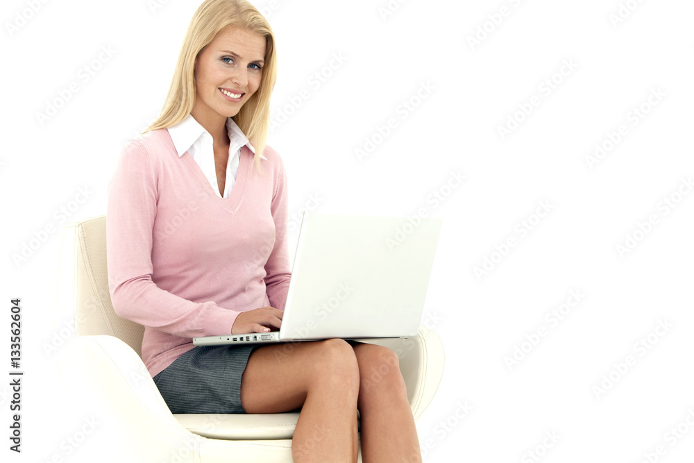 Portrait of a Beautiful woman using a laptop on her knees Portrait of a Beautiful woman using a laptop on her knees