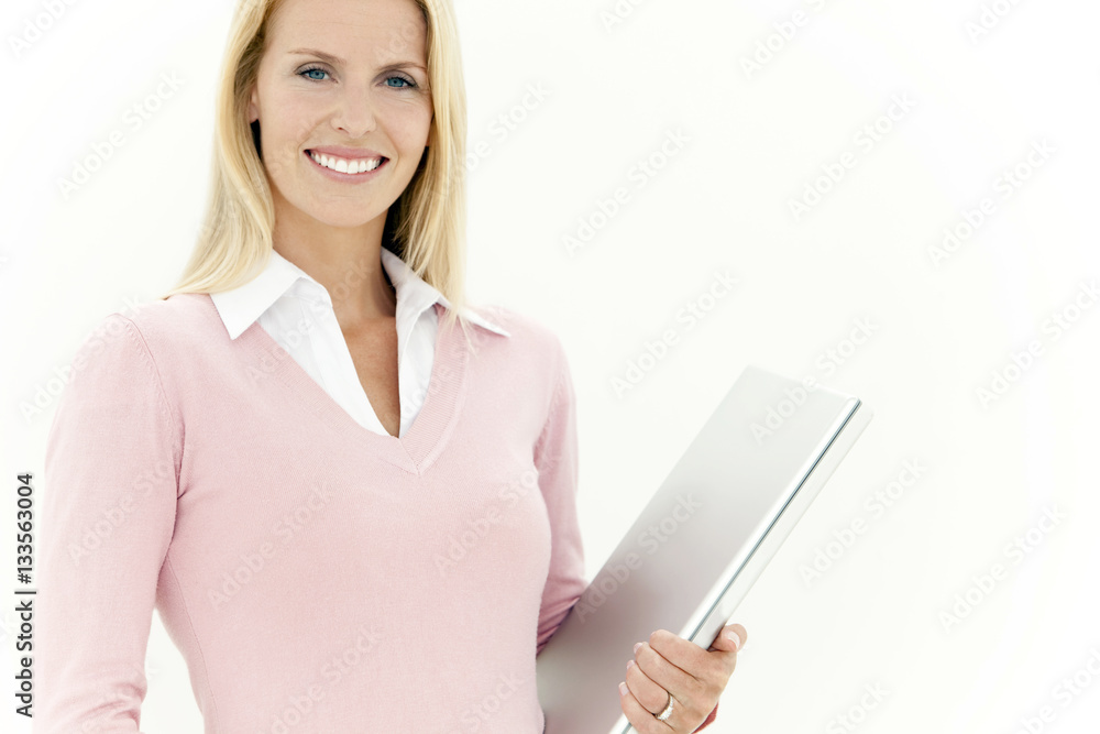 Portrait of a beautiful woman holding a laptop Portrait of a beautiful woman holding a laptop