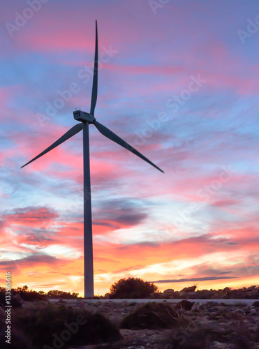 Wind energy park at sunset II photo