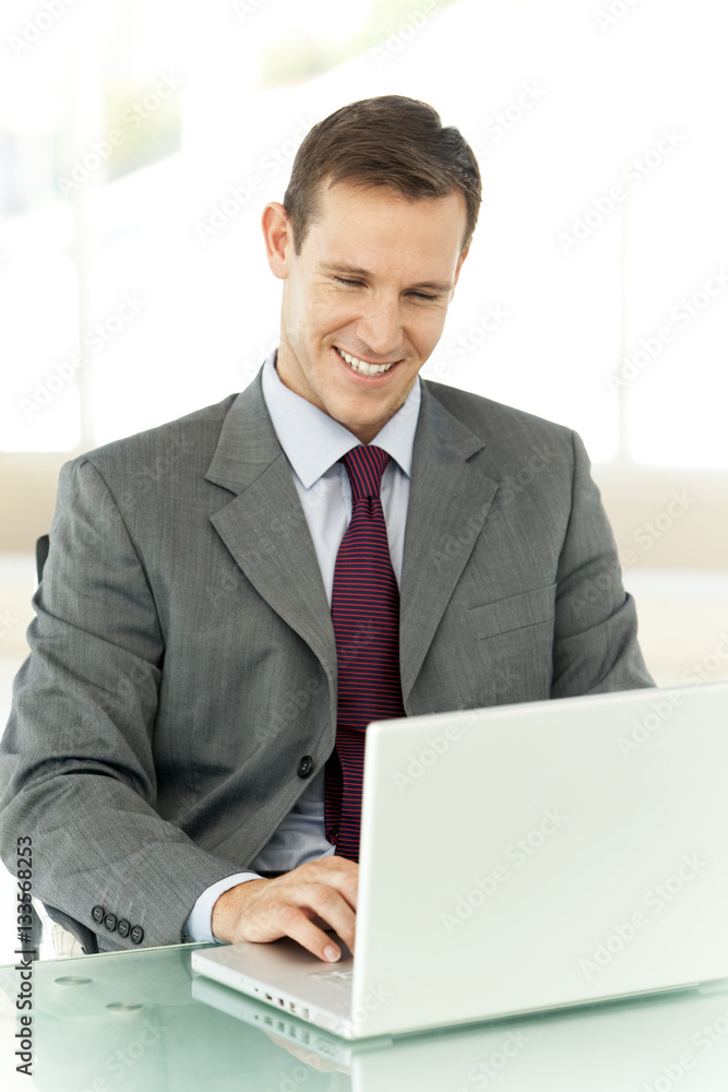Single Caucasian businessman at work in office Single Caucasian businessman at work in office
