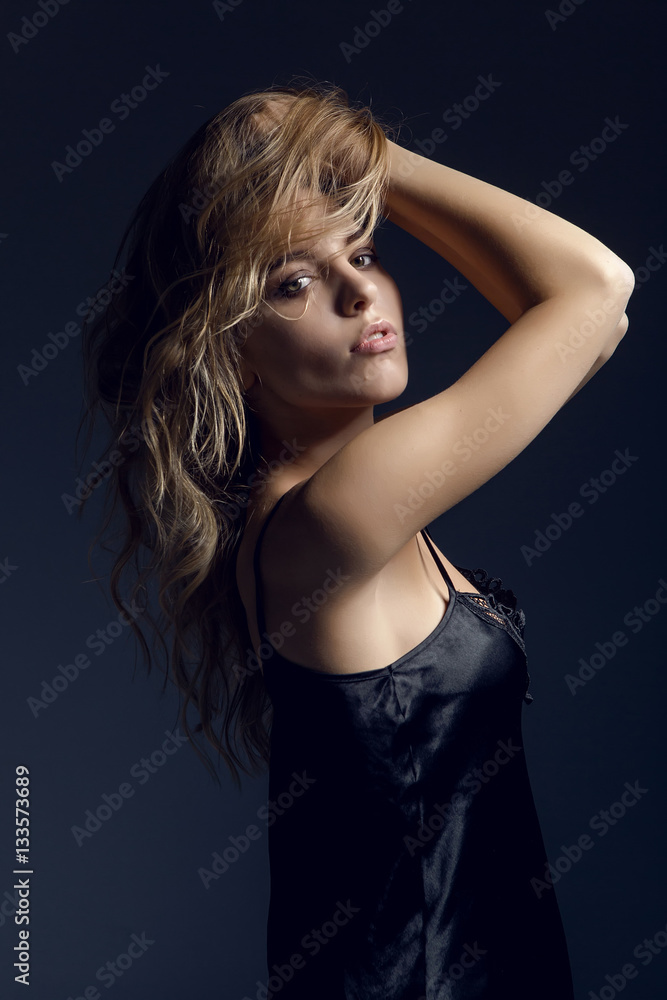 young sexual girl blonde long hair in black underwear, black boots and a leather jacket sitting on a wooden high chair young sexual girl blonde long hair in black underwear, black boots and a leather jacket sitting on a wooden high chair
