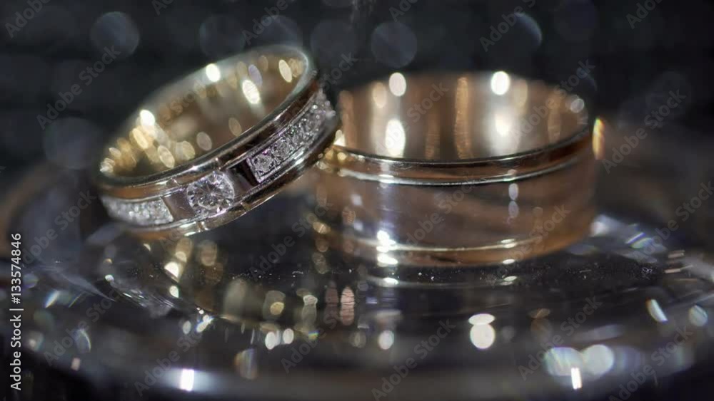 Gold wedding rings. Transfusion of light on rings. Gold wedding rings Gold wedding rings. Transfusion of light on rings. Gold wedding rings