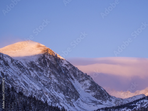 Snowy Colorado mountains during sunrise