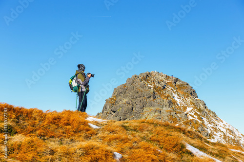 Woman taking photo, Tatra Mountains, Poland