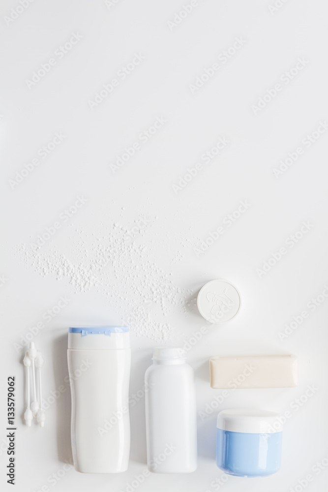 baby organic cosmetic for bath on white bakground top view baby organic cosmetic for bath on white bakground top view