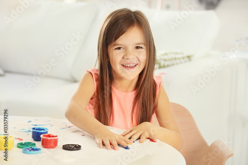 Cute little girl drawing wi...