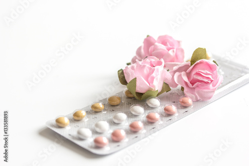 concept of female contraception on white background