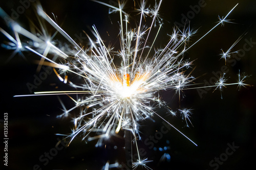 Bengal fires, beautiful sparks on a black background © Artcomma