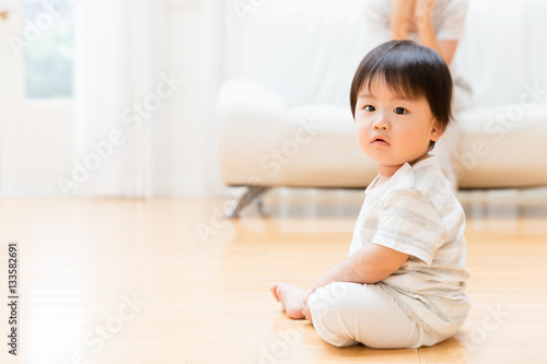 portrait of asian baby in living room