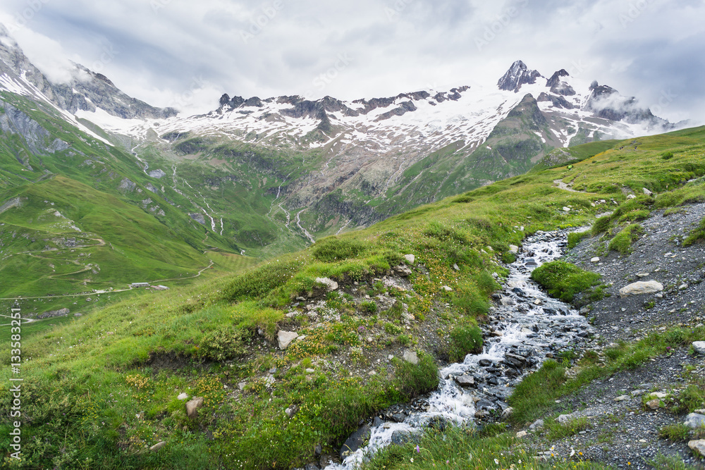 Small stream flows along the Tour du Mont Blanc trail in France