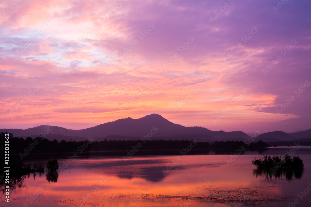Naklejka premium colorful dramatic sky with cloud at sunset