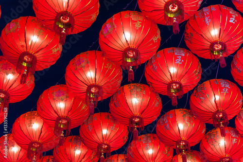 Close up Beautiful traditional Chinese Lantern lamp in red color. Chinese red lanterns hanging at night for decoration during the Chinese New Year festival. Chinese Red lanterns illuminated at night