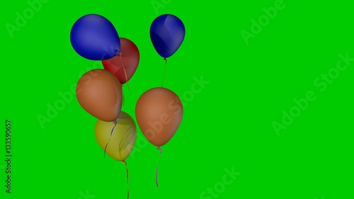 colorful balloons flying from the bottom up on a green background