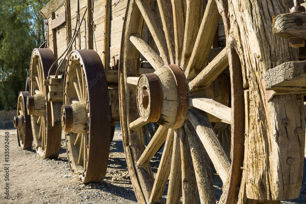Wheels of a wagon trainin at Furnace Creek, Death Valley, CA Wheels of a wagon trainin at Furnace Creek, Death Valley, CA