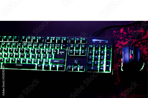 Playing computer game with gaming gear.