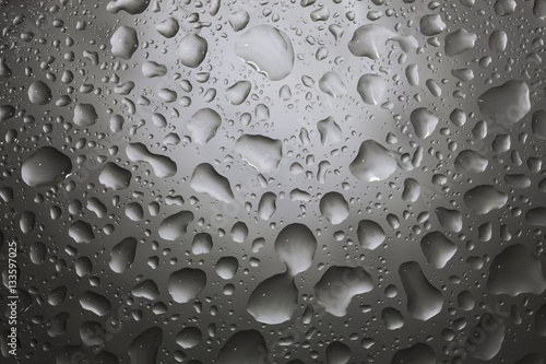 Water drops on dark wall and light, water drop for background 