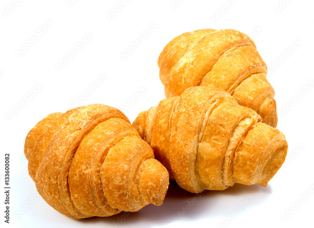 Fresh butter croissant, isolated on white background.