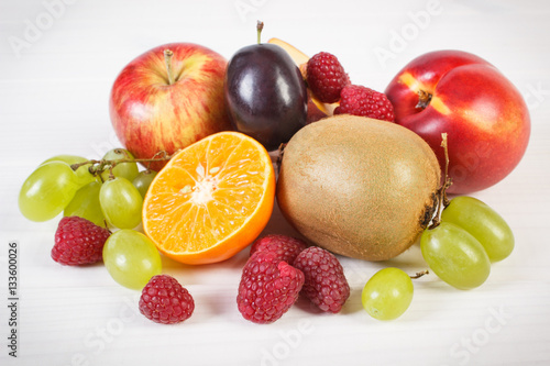 Fresh ripe fruits on white boards  healthy nutrition