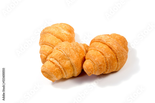 Fresh butter croissant, isolated on white background.