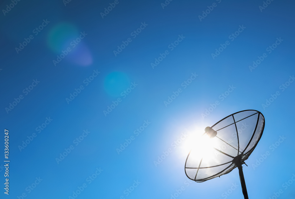 satellite dish and shining sun