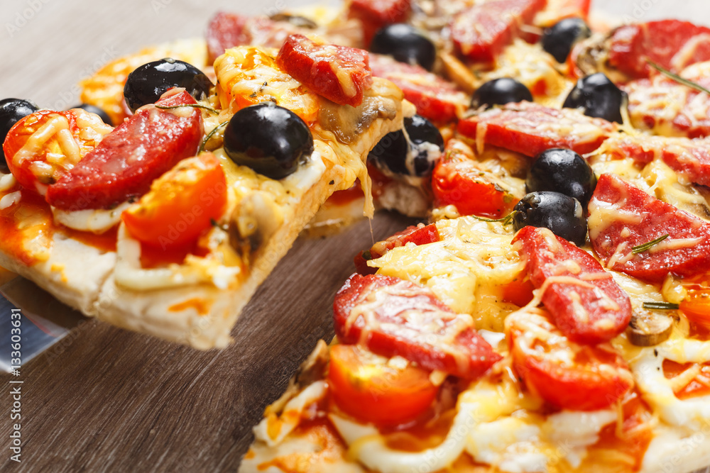 Taking slice of pizza Taking slice of pizza