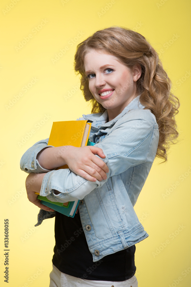 Young beautiful cheerful student girl Young beautiful cheerful student girl