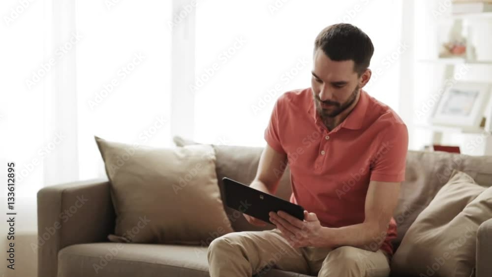 unhappy man suffering from backache at home unhappy man suffering from backache at home