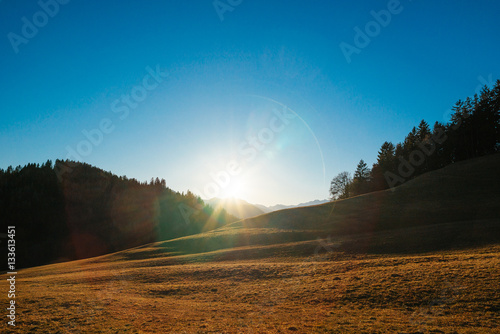 Sunstar mountain landscape