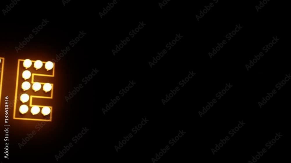 Shining word 'Cine' ('Cinema' in Spanish), moving in darkness