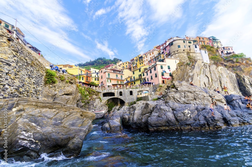 Manarola town, Riomaggiore, La Spezia, Liguria, northern Italy. The colourful houses on hills, the sea, balconies and windows. Part of the Cinque Terre National Park and a UNESCO World Heritage Site.