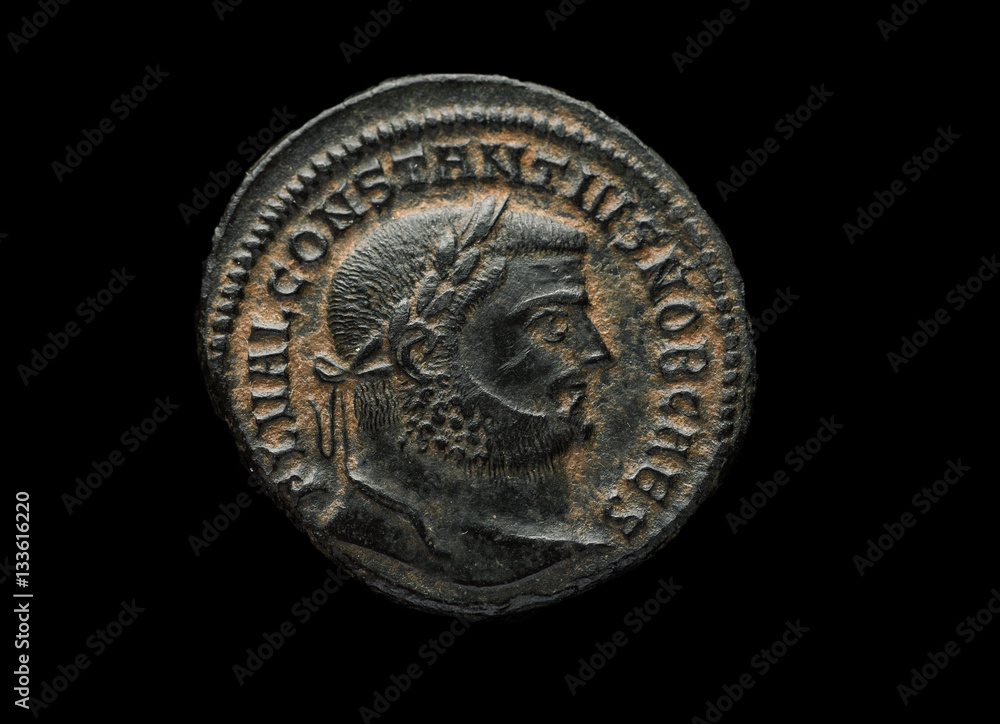 Ancient roman copper coin of emperor Constantius isolated on black Ancient roman copper coin of emperor Constantius isolated on black