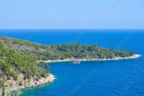 Boats in secluded bay, Thassos Island, Greece 